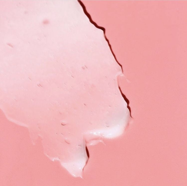 Close-up of BLUSH hydrating hair mask showing its rich, creamy texture designed to deeply moisturize and nourish hair lengths