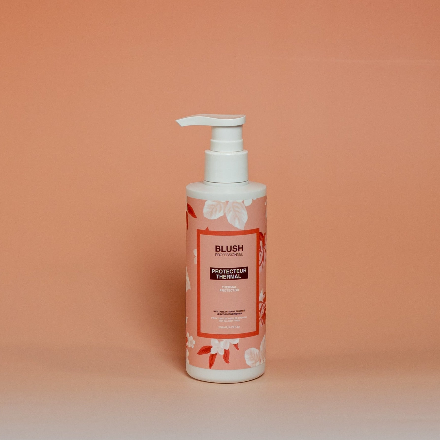 BLUSH 10-in-1 heat protectant spray that hydrates, detangles, protects hair from heat damage, helps preserve color, and improves softness, shine, and manageability