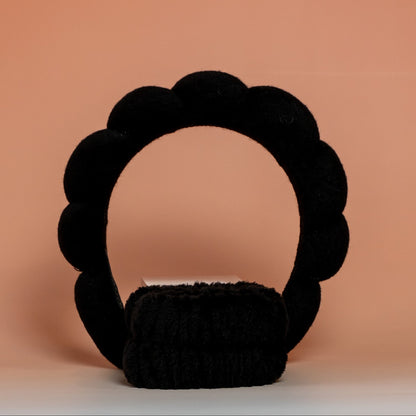 Black BLUSH skincare headband and wristband set designed to keep hair dry and out of the way during skincare routines, with a soft and comfortable texture