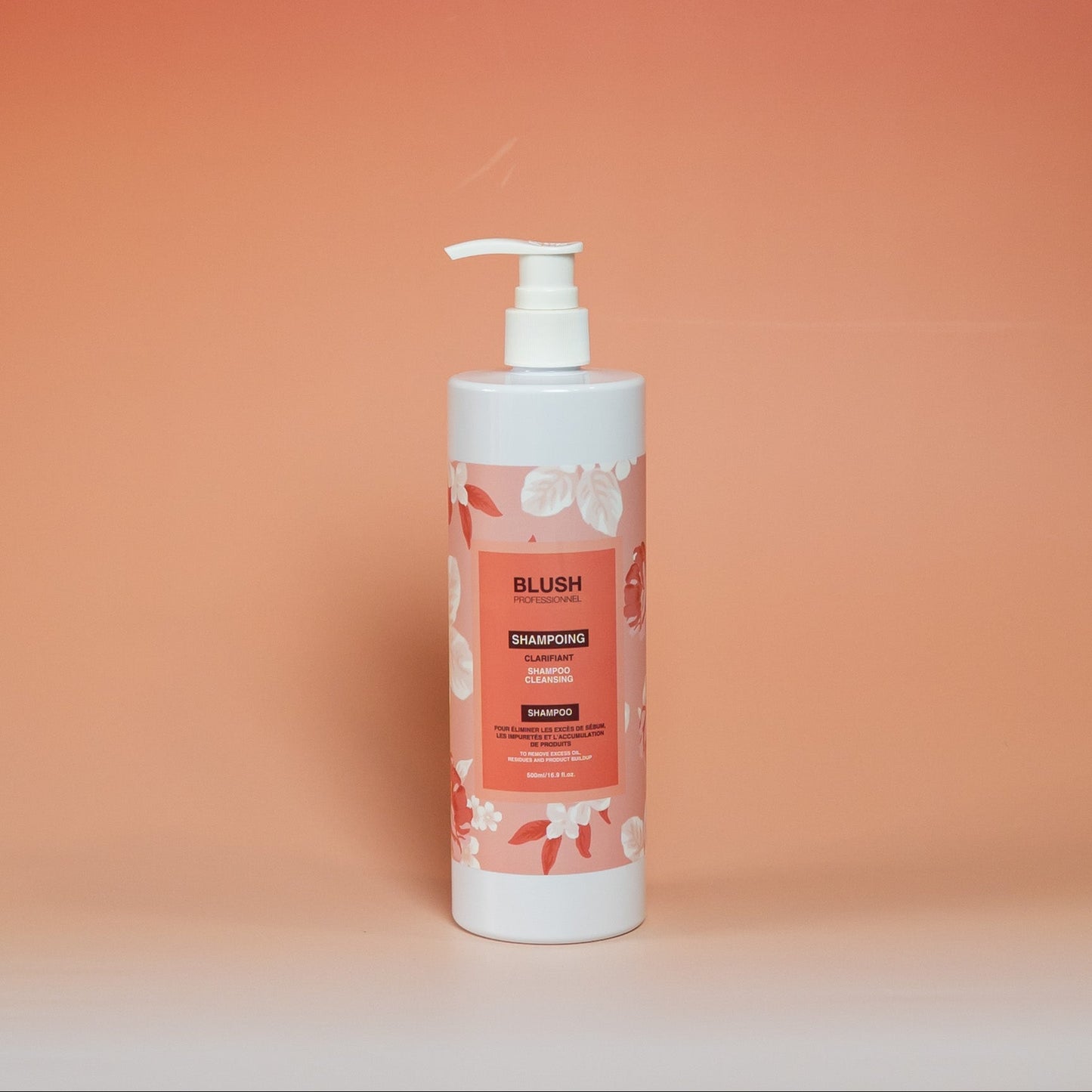 BLUSH clarifying shampoo formulated to remove product buildup, excess oil, and impurities while preparing hair for professional treatments