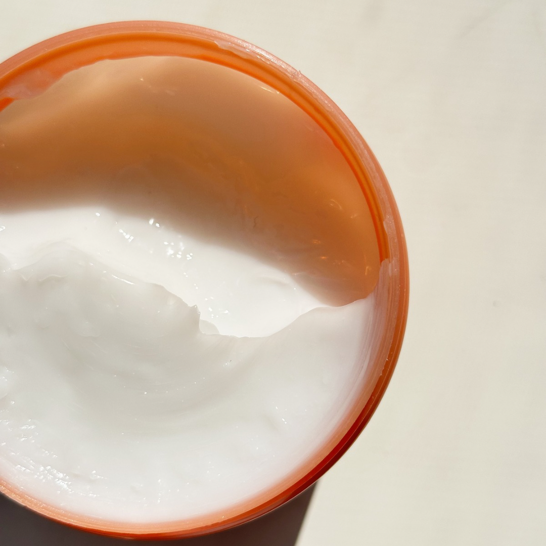 Top view of BLUSH Cure Absolue Original hair treatment showing the creamy texture of the product designed to deeply repair, smooth, and nourish hair fibers