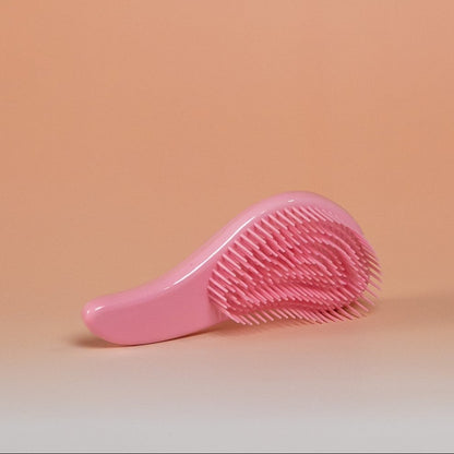 Light pink BLUSH detangling brush for dry, damp, or wet hair