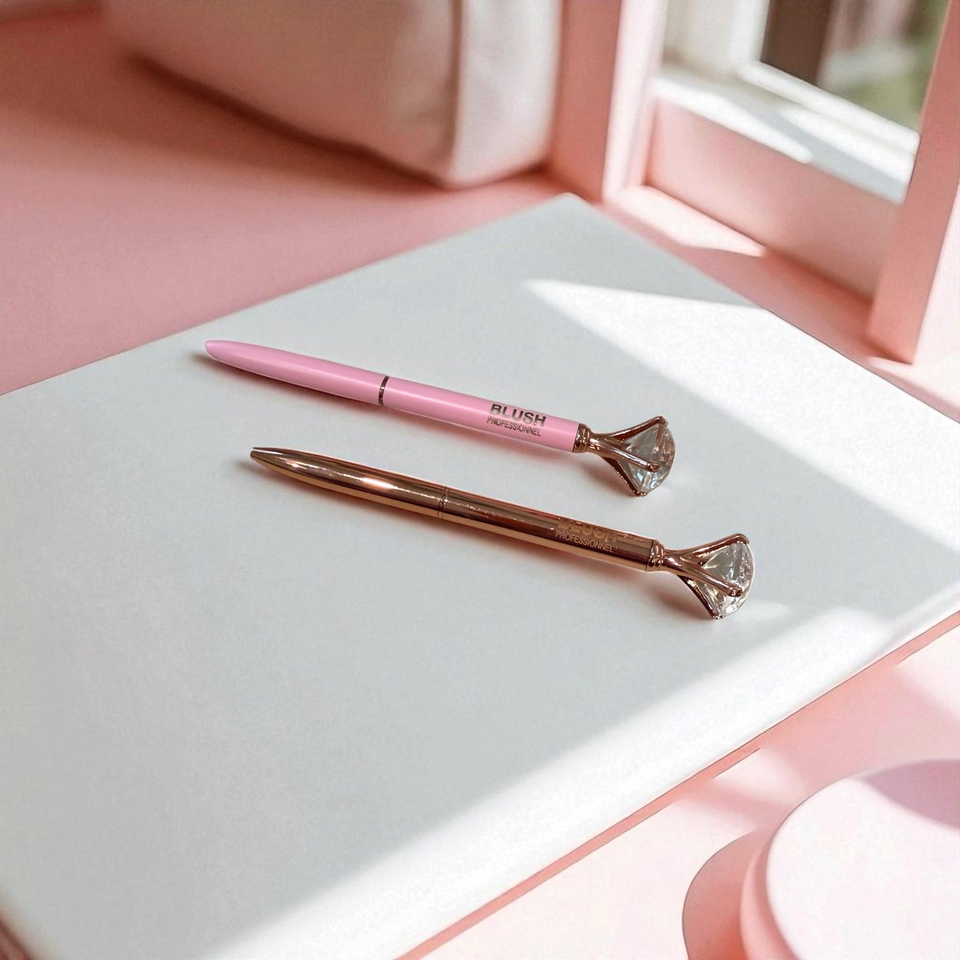 BLUSH diamond pens placed on a work desk, featuring smooth black ink writing and an elegant crystal tip, representing stylish everyday writing