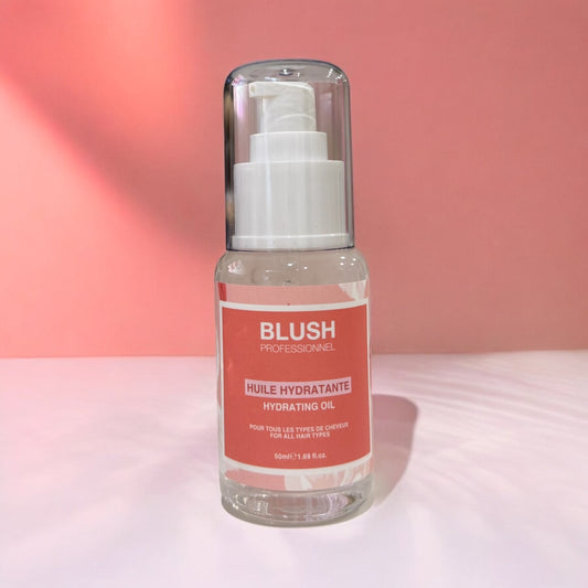 BLUSH hydrating hair oil designed to deeply nourish hair lengths, reduce dryness, and add softness and natural shine
