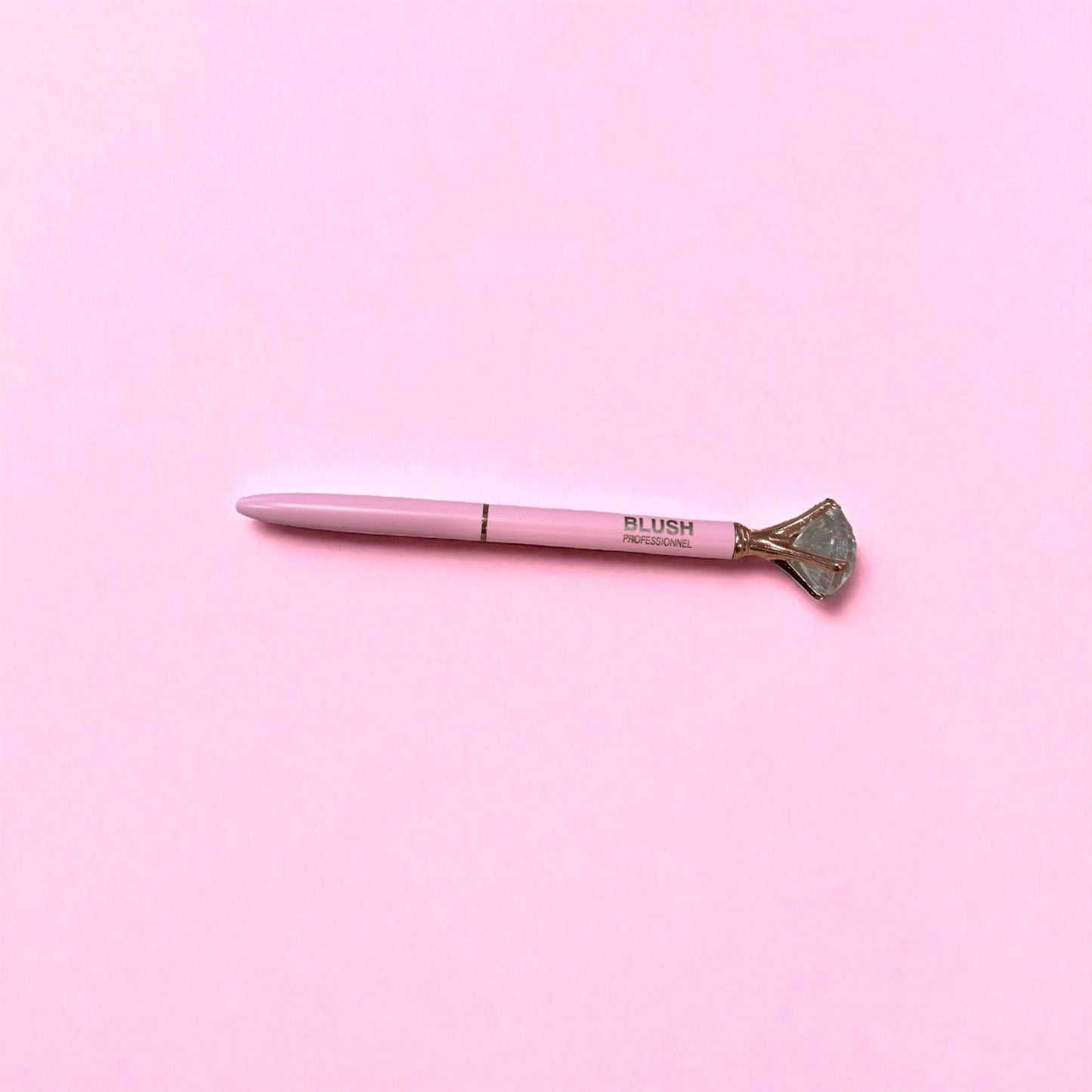 Pink BLUSH diamond pen with smooth black ink, featuring an elegant crystal tip for precise and stylish writing