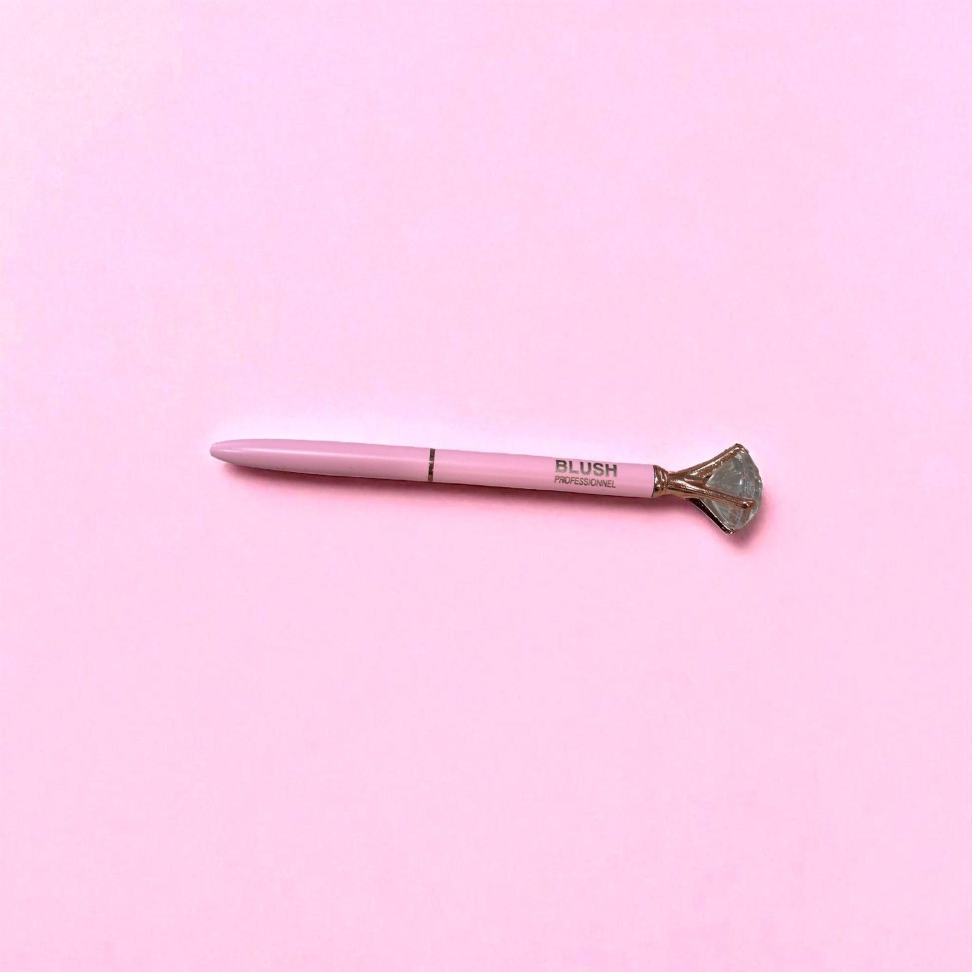 Pink BLUSH diamond pen with smooth black ink, featuring an elegant crystal tip for precise and stylish writing