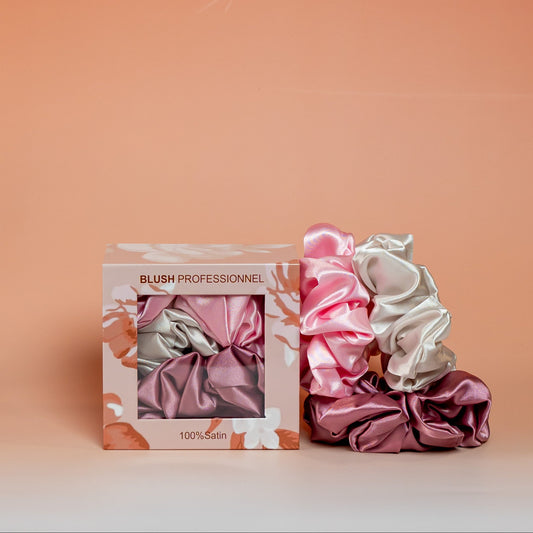 Pink BLUSH satin scrunchies gift box containing 3 satin scrunchies that help reduce friction and minimize hair breakage
